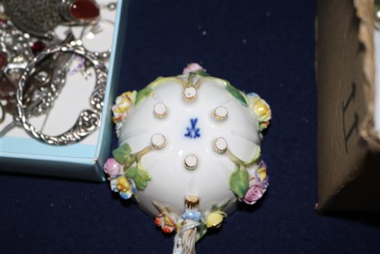 A Meissen flower encrusted cup and saucer